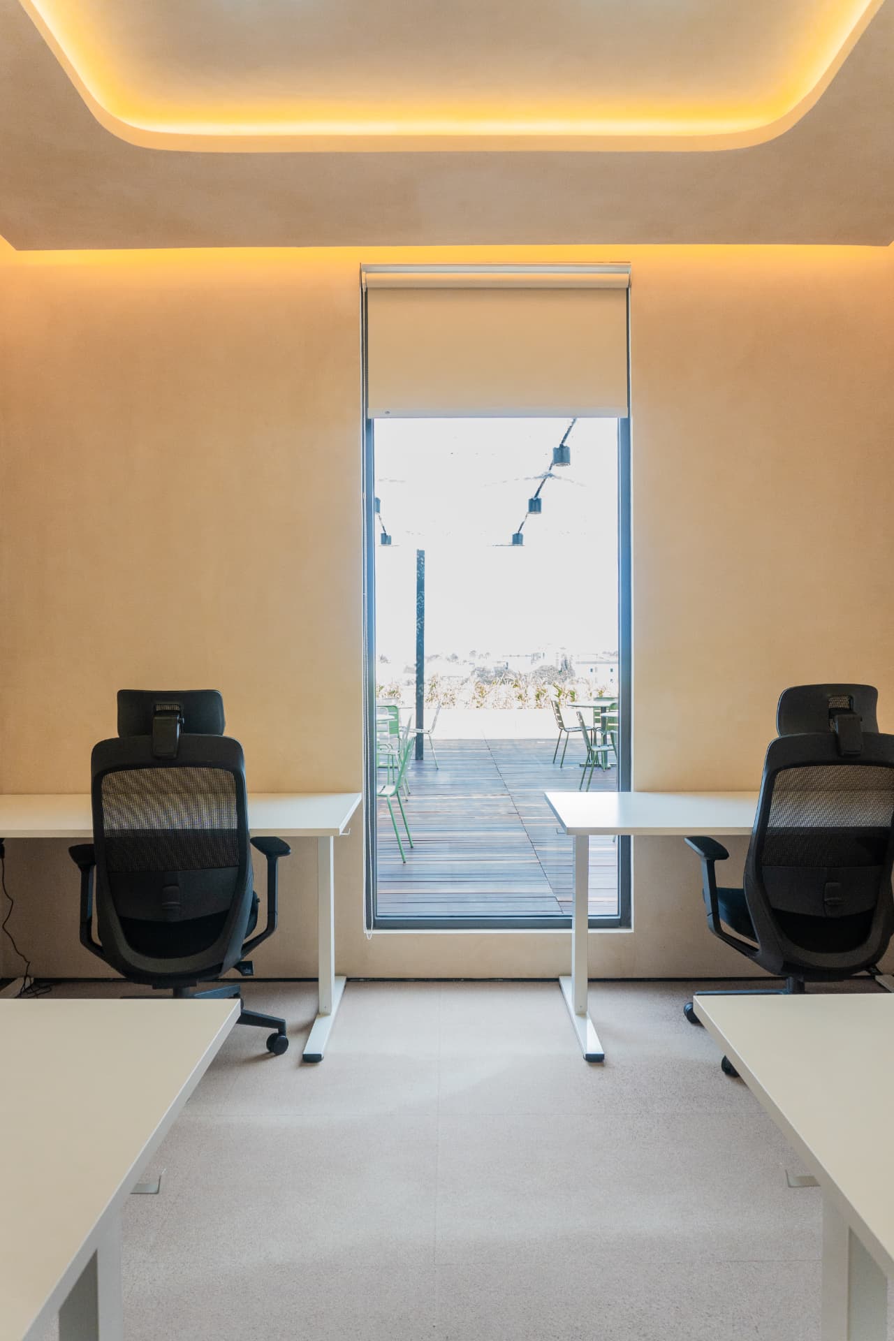 A private office at Argil in Pererenan, with desks opening onto a terrace